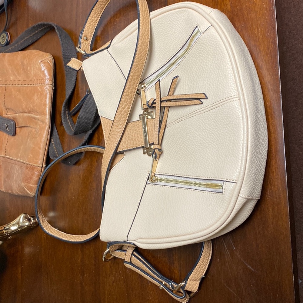 Magnificent new without tags, tan and dark tan Crossbody purse
